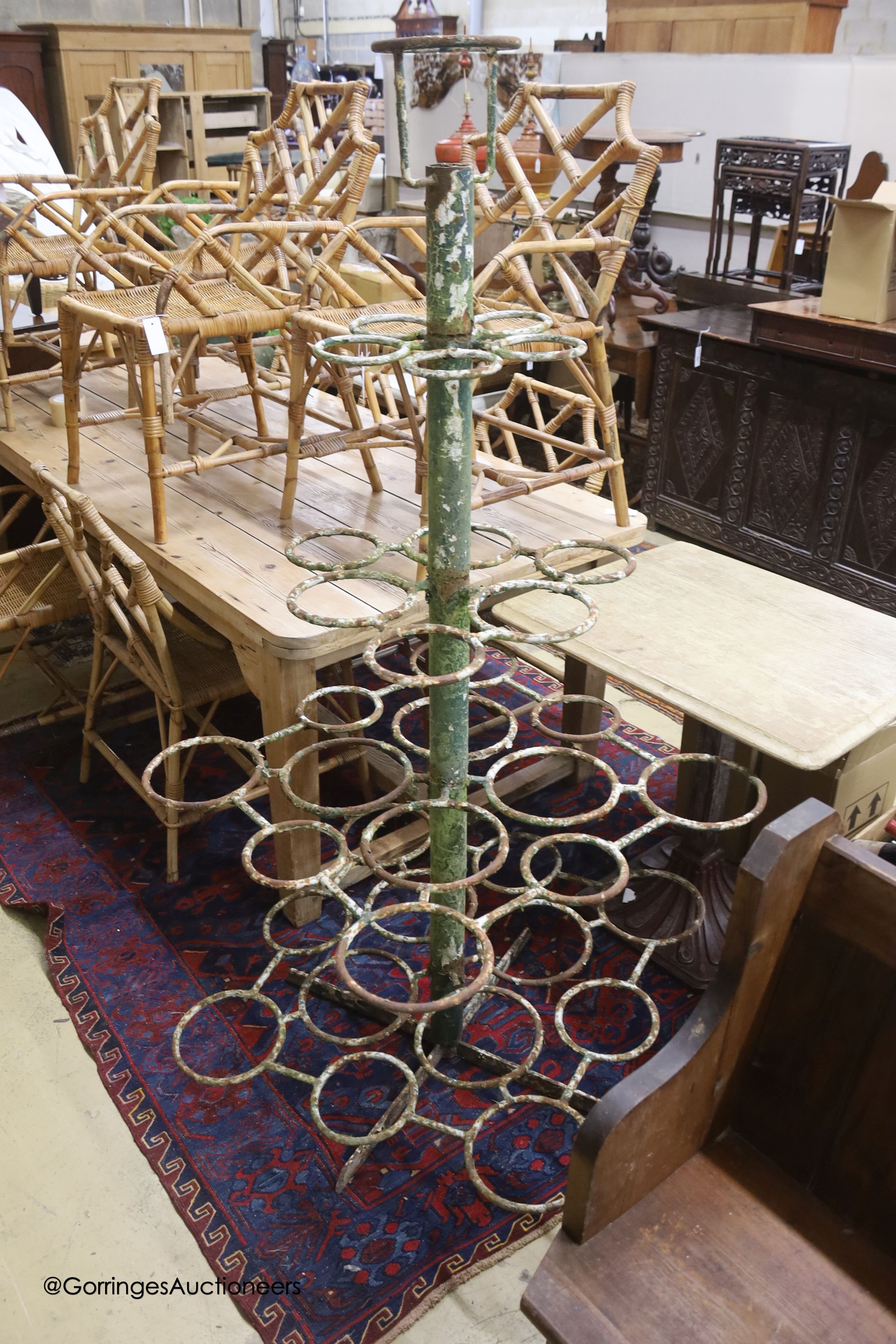 A Victorian style painted wrought iron pot stand, height 170cm